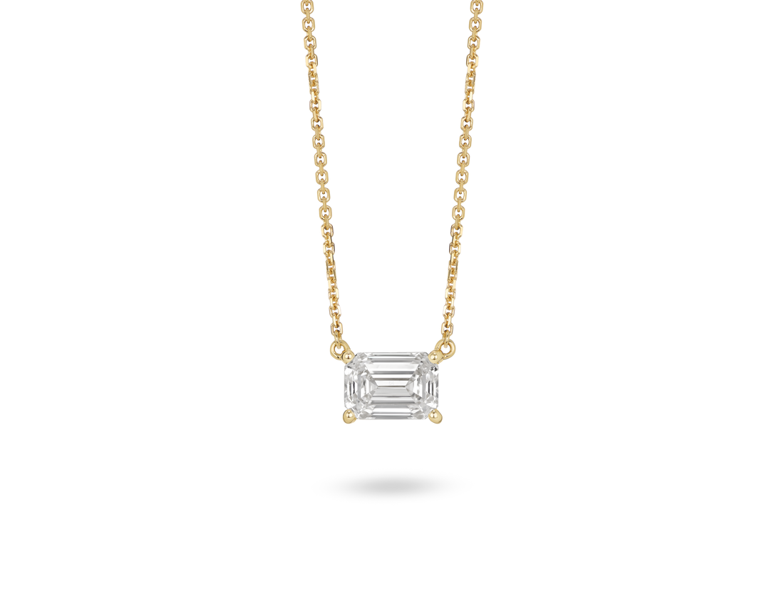 Front view of 1 carat emerald cut solitaire pendant in 14k yellow gold
